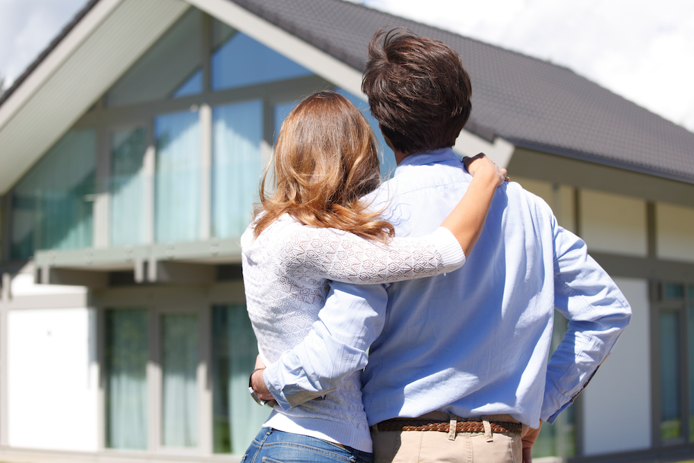 Couple looking at a house